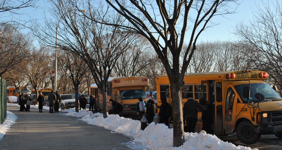 Students arrive at M.S. 139, in Washington Heights on Jan. 24. Mayor Bill de Blasio decided to keep schools open last week, despite the snowstorm and the cold temperatures. (Lucia De Stefani/NY City Lens)