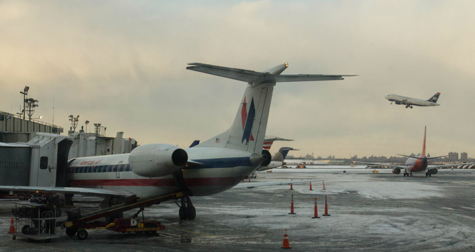 With the Super Bowl fast approaching, city officials, including those at the New York City area airports, say they are ready to handle the influx of tourists, even if another cold blast hits. (Louise Dewast/NY City Lens)