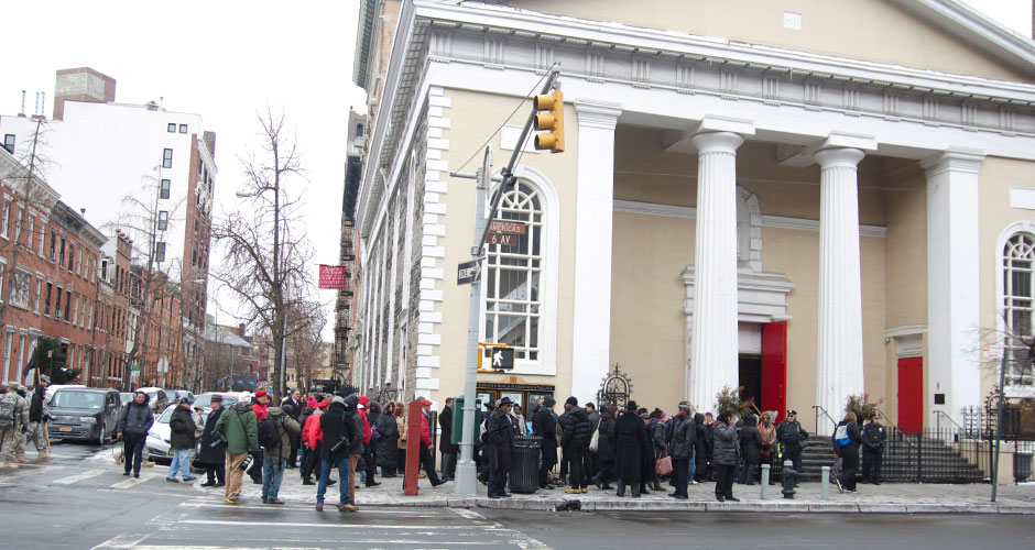 Mourners waiting to attend the funeral of Avonte Oquendo, 12, line up outside St. Joseph's Church in Greenwich Village in New York City on Saturday. Avonte disappeared from school last October, leading to a city-wide effort to find him. That search ended when his remains were found by the East River. (Asha Mahadevan/NY City Lens)