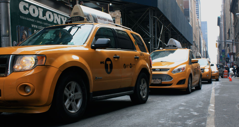 New York City taxis grind to a halt in midtown Manhattan on Jan. 27, 2013. The city closed Broadway between 34th and 47th streets to transform the area into Super Bowl Boulevard, where festivities are slated to kick off Wednesday. (Sybile Penhirin/NY City Lens)