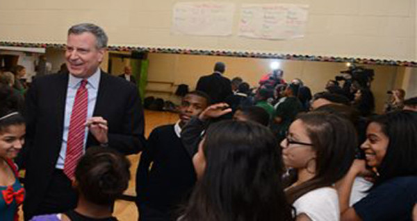 Mayor Bill de Blasio speaks with students at the Bronx School of Young Leaders at 40 West Tremont Avenue in the Bronx, NY on Thursday, Jan. 9, 2014. (AP Photo/New York Daily News, Enid Alvarez/Pool)