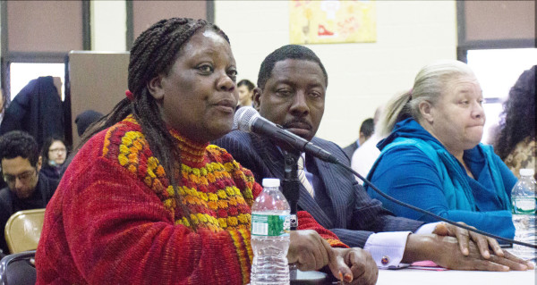 Shirley Aikens, 60, president of the Carey Gardens Residents Association, testifies to the City Council about the use of temporary boilers in NYCHA public housing. (Caroline Anderson/NY City Lens)