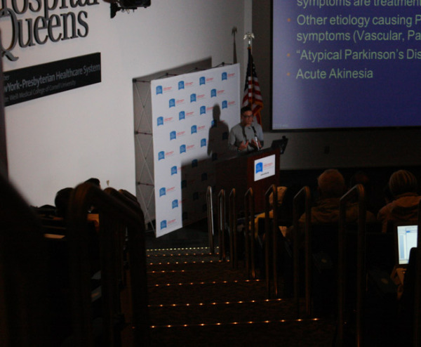 Dr. Edward Choi speaks about the symptoms of Parkinson's Disease during the October 11 lecture at New York Hospital of Queens. (Pola Lem/NY City Lens)
