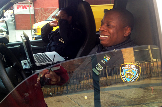 Officer Williams of the 79th Precinct on school run detail at the corner of Tompkins Avenue and Floyd Street.