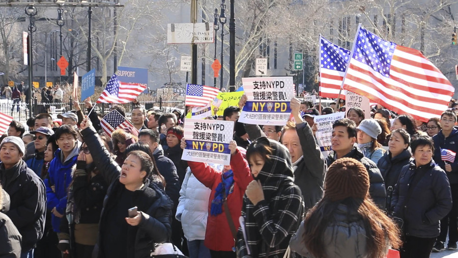 Chinese Americans rally against the indictment of officer Liang.