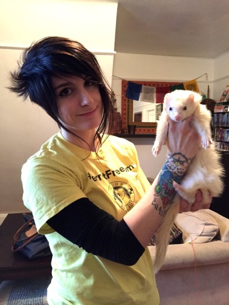 Veronica N. holding her ferret Nacho.