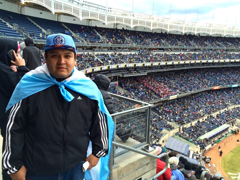 Jairo Villamar wears the flag from his hometown in Ecuador. He said he decided to bring it because the colors match those of NYCFC.