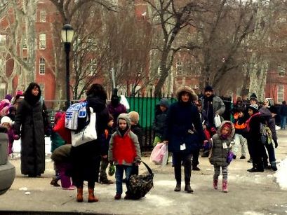 Children walk out of the Msgr. McGolrick Park in Greenpoint (Joanna Socha/NYCityLens)