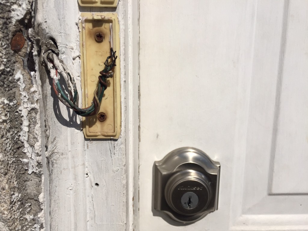 The disconnected door buzzer.