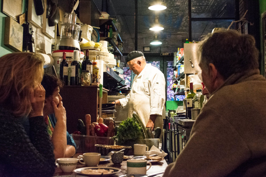 Ali El-Sayed cooks dinner for Danish travelers at his restaurant, Kabab Cafe, on Steinway Street. September 26th, 2015 © Lani Chan