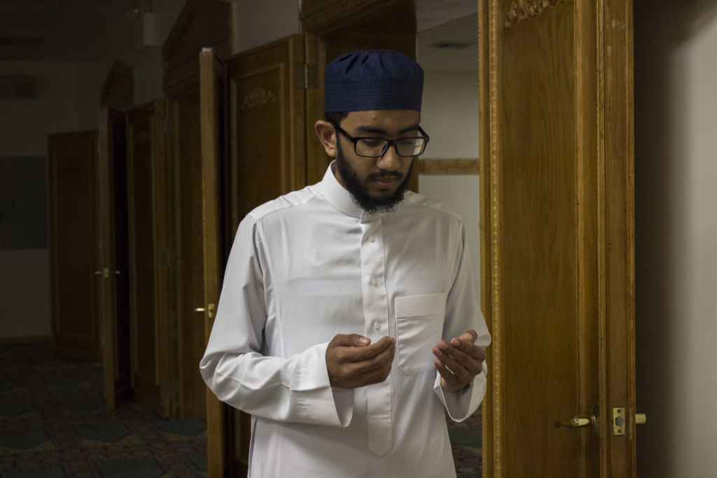 Junaid Jafar lifts his hands up to Allah the Creator, inside the Al-Mamoor Mosque in Jamaica, Queens, on Sept. 27, 2015.