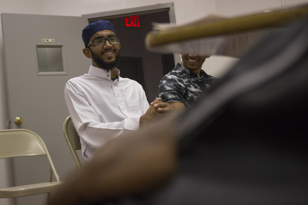 Jafar smiles during a youth meeting at the Jamaica Muslim Center in Queens, New York. The meeting on Sept. 27, 2015, was frequently interrupted by laughter.