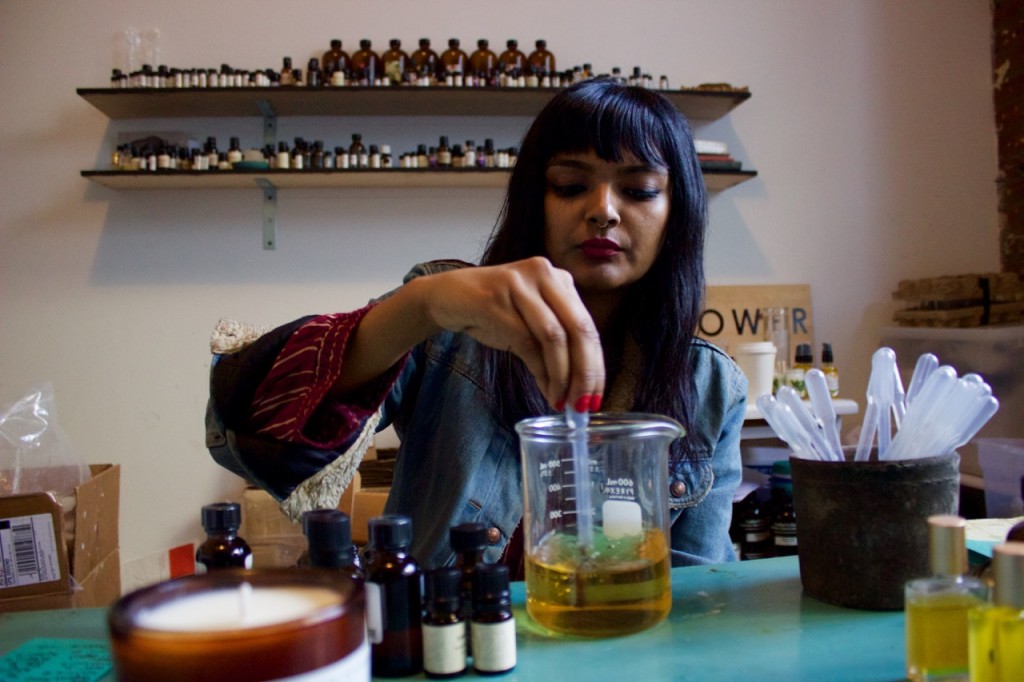 Tanwi Nandini Islam, a perfume and candle maker, mixing a new scent, in her Bushwick studio, in Queens, on Oct. 21, 2015.