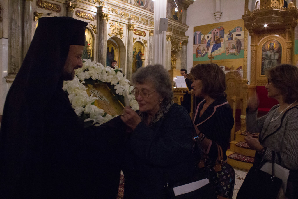 Parishioners gathered in a line to kiss the icon of Saint Raphael at the end of the Friday vesper prayers at St. Nicholas Antiochian Cathedral on Nov. 7, 2015. Photo: Sneha Antony.