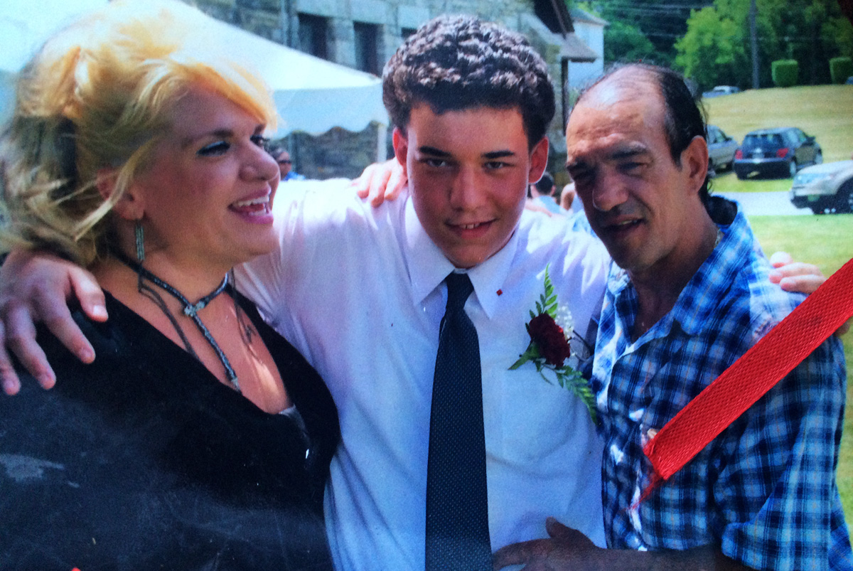 A family snapshot: Irene Vrachnos, Dimitrios Safetis and his father, Yannis Safetis, share a moment after Dimitrios' high school graduation.