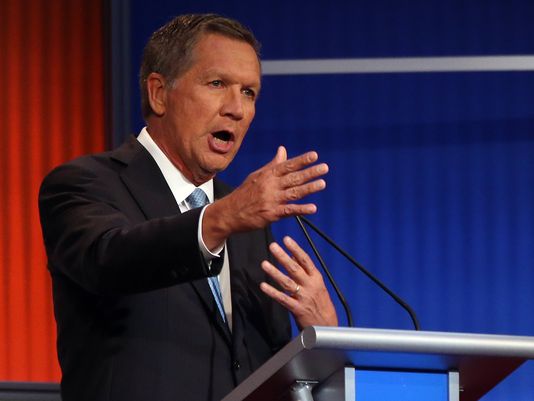 Ohio Gov. John Kasich speaks at the first Republican presidential debate. Kasich's camaign just released an ad criticizing Sen. Ted Cruz over his "New York Values" line (Andrew Harnik/AP)