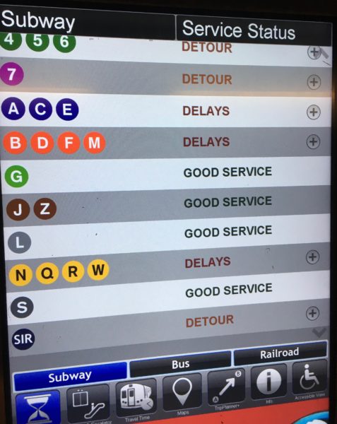 An electronic display at the Times Square–42nd Street Station shows multiple train services delayed or detoured during the afternoon rush hour. Keenan Chen for NY City News.
