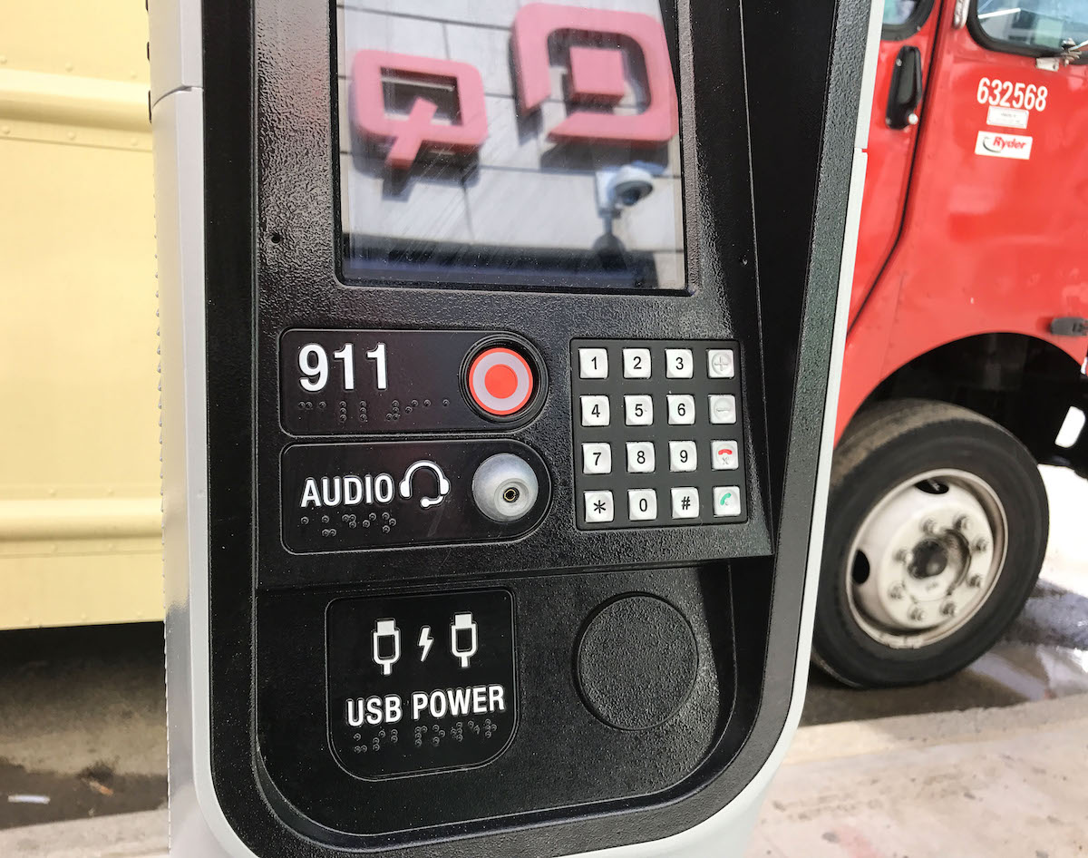 Each station is equipped with an emergency 911 button and users can make free calls to anywhere in the U.S. (Katryna Perera/NY City Lens)