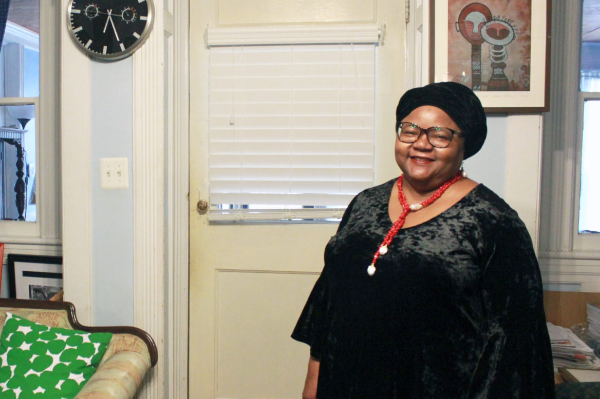 Professor Mojubaolu Okome at home, in Brooklyn, New York City. (Emma Vickers/NYCityLens)