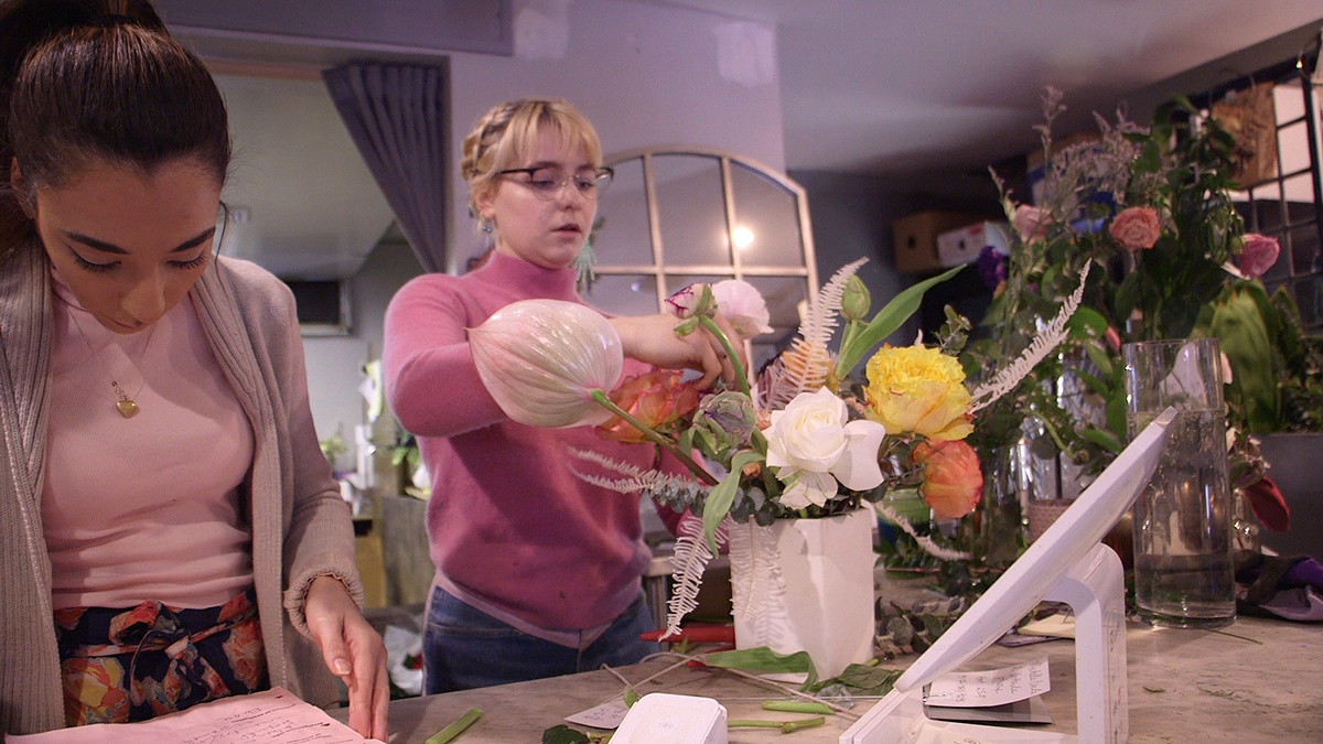 Staffers at Rosehip Social Florist in Williamsburg, Brooklyn prepare arrangements on Valentine's Day. Photo by Lauren Craddock.
