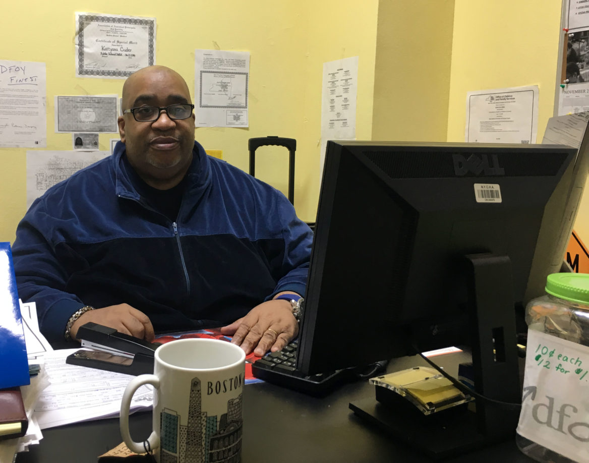 Clyde Thompson sits in his office in the Butler community centre in the Bronx. (Emma Vickers/NY City Lens)