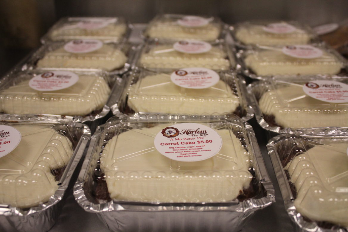 Carrot cakes labelled and ready for sale (Emma Vickers/NY City Lens)