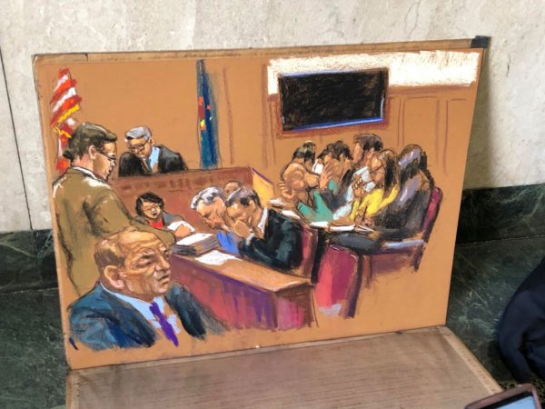 A sketch artist shows her drawing of the jury during the second day of deliberations of the Harvey Weinstein trial. (Photo by TuAnh Dam for NY City Lens)