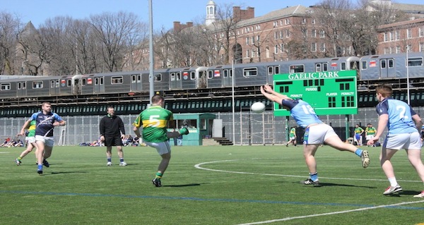 Players battle in a Gaelic football match on opening day of Gaelic Park in The Bronx. (Patrick McGovern/NY City Lens)