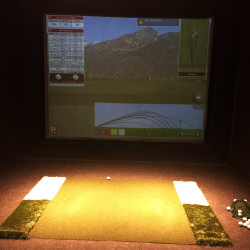 An indoor golf simulator at the Chelsea Piers Golf Club in Manhattan