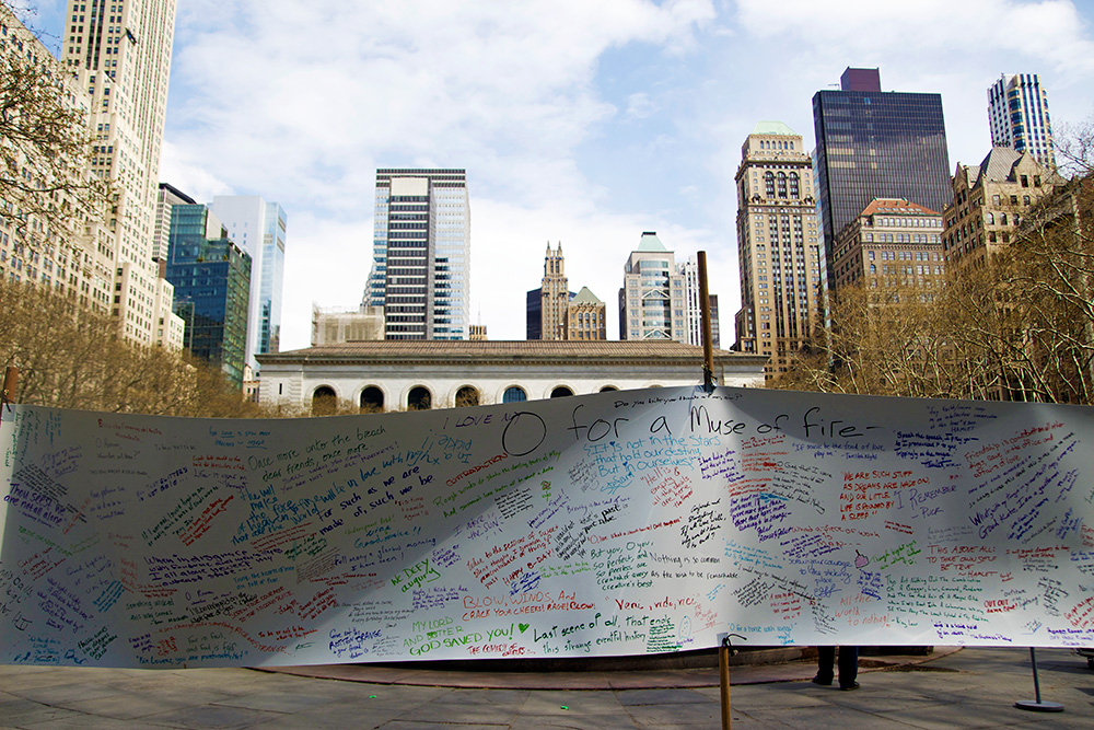 A Play of Words. A banner raised high in Bryant Park. Yvonne Juris/ NY City Lens.