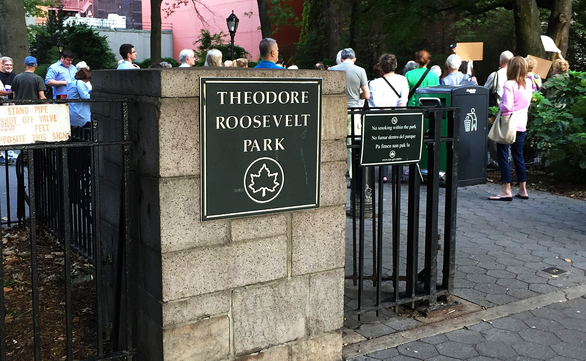 Residents gather in Theodore Roosevelt Park, just outside the Museum of Natural History