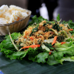 Indonesian shrimp cracker and sayur urap (coconut-sprinkled vegetable)