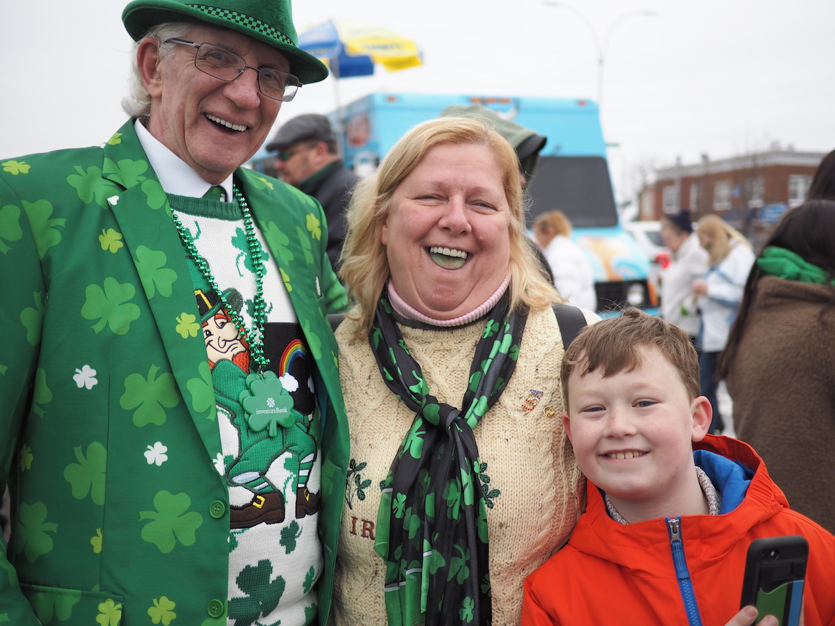 Own Loof, Penny Knight and her son celebrate the first St. Patrick's Day parade of the year in the Rockaways (Alice Chambers / NY City Lens)