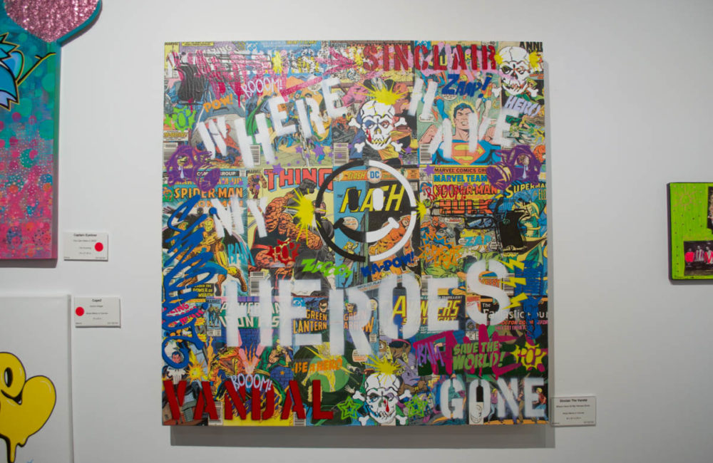 Sinclair the Vandal's piece "Where Have All My Heroes Gone" is featured in the exhibit "New York Artists for the Bronx," which opened to the public Saturday, January 29. Elizabeth Maline for NY City Lens