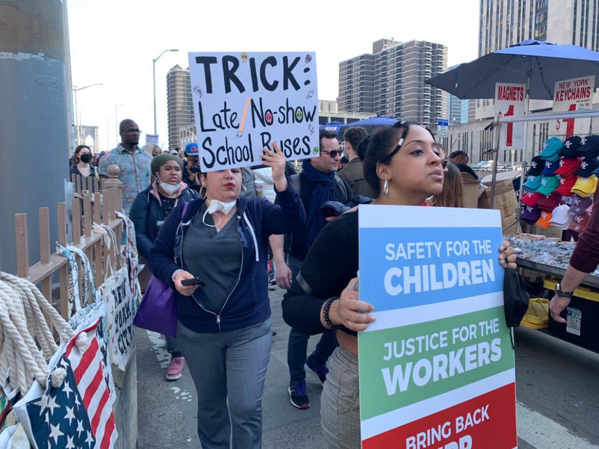 Giselle Ramirez (on the right) marches over the Brooklyn Bridge, calling for transportation inclusion, equity, and reform for her son. Mar 19, 2022. (Photo by Eleonora Francica for NY City Lens)